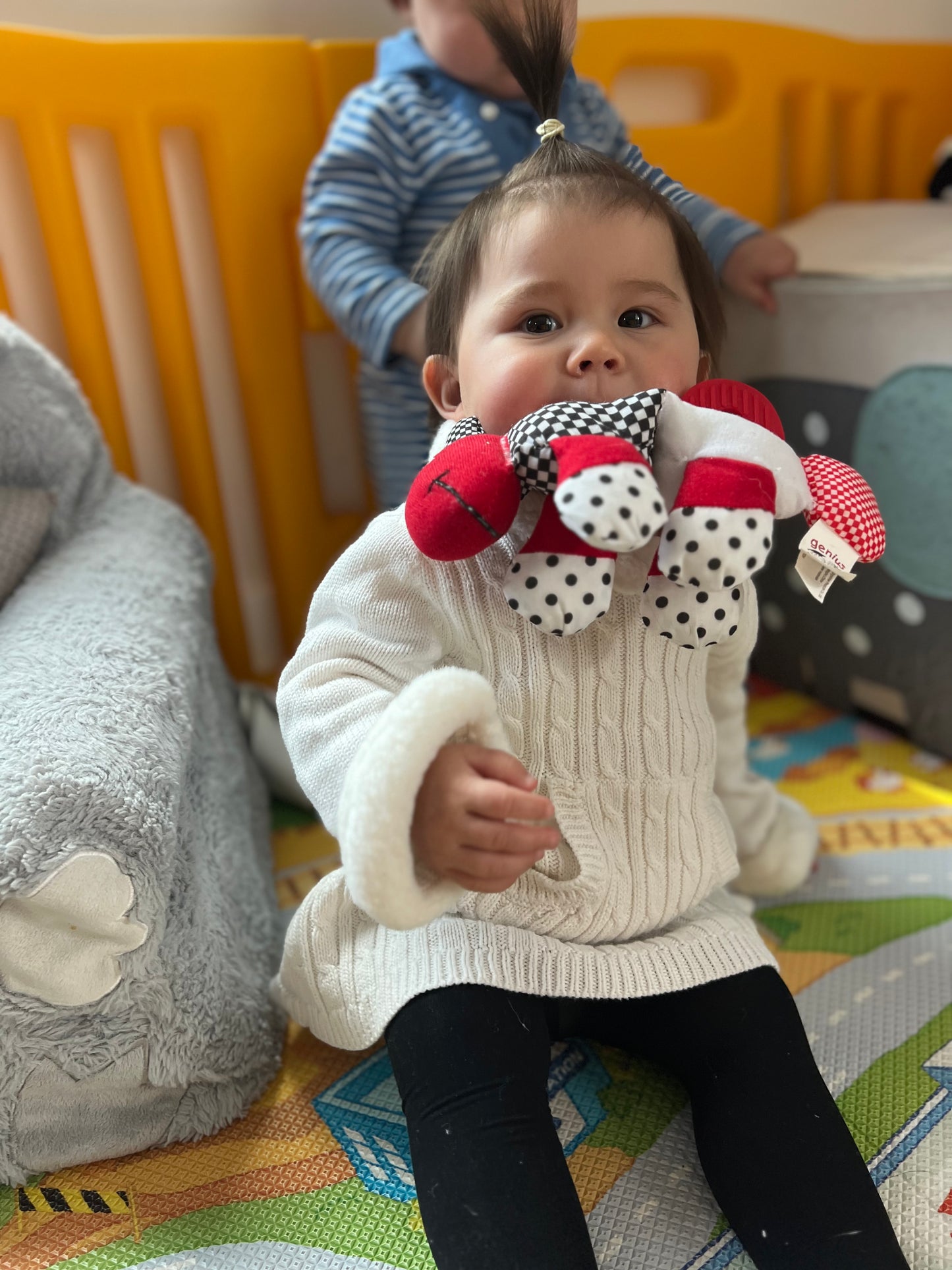 Baby Sia Playing with Caterpillar Teether